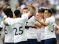 Tottenham Hotspur's Son Heung-min celebrates scoring their first goal with teammates on August 29, 2021