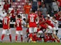 Benfica's Gilberto celebrates scoring their second goal with teammates in August 2021