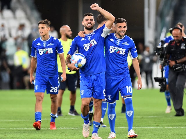 Empoli's Patrick Cutrone celebrates with Nedim Bajrami after the match on August 28, 2021