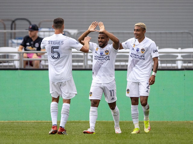 Los Angeles Galaxy midfielder Samuel Grandsir (11) celebrates his goal with defender Daniel Steres (5) and defender Julian Araujo (2) in the second half against the Colorado Rapids at Dick's Sporting Goods Park on September 11, 2021