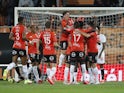 Lorient's Armand Lauriente celebrates scoring their first goal with teammates on September 10, 2021