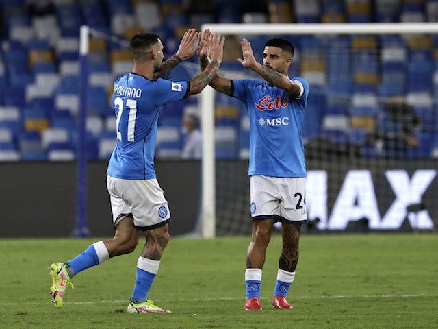 Napoli's Matteo Politano celebrates scoring their first goal with Lorenzo Insigne on September 11, 2021