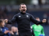 Luton Town's manager Nathan Jones celebrates at the end of the match on September 11, 2021