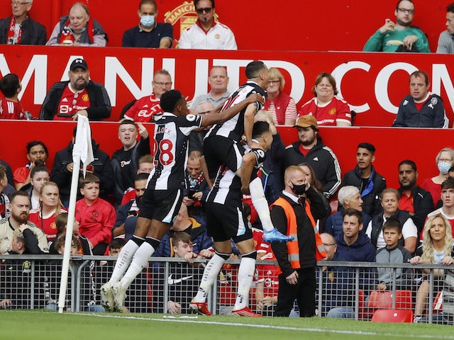 Newcastle United's Javier Manquillo celebrates scoring their first goal with teammates on September 11, 2021