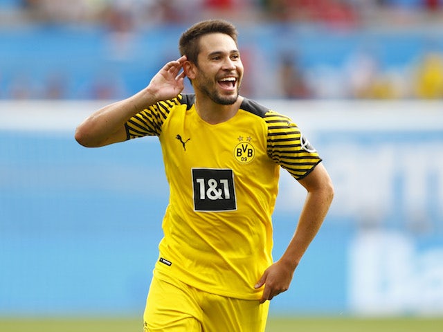 Borussia Dortmund's Raphael Guerreiro celebrates scoring their third goal on September 11, 2021