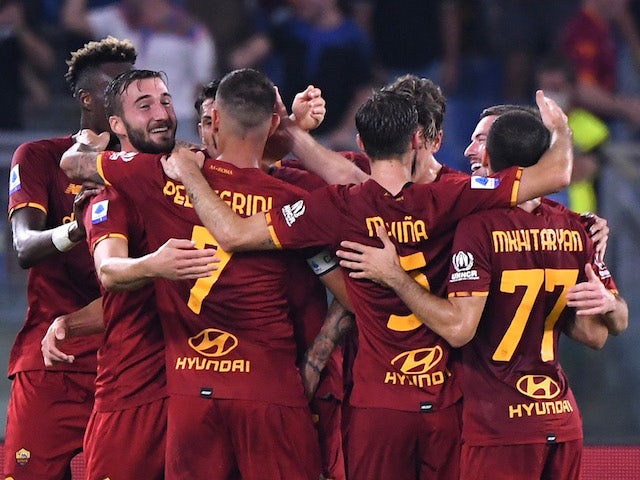 Roma's Bryan Cristante celebrates scoring their first goal with teammates on September 12, 2021