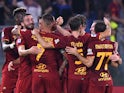 Roma's Bryan Cristante celebrates scoring their first goal with teammates on September 12, 2021
