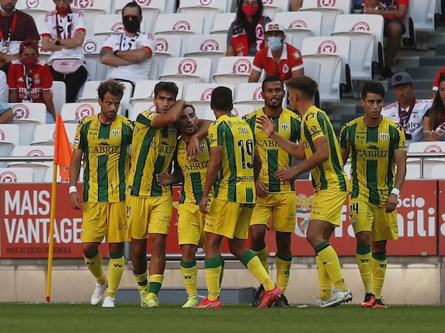 Tondela's Salvador Agra celebrates scoring their first goal with teammates in August 2021