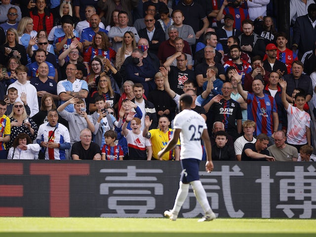 Tottenham Hotspur's Japhet Tanganga walks off the pitch after being shown a red card by referee Jonathan Moss on September 11, 2021
