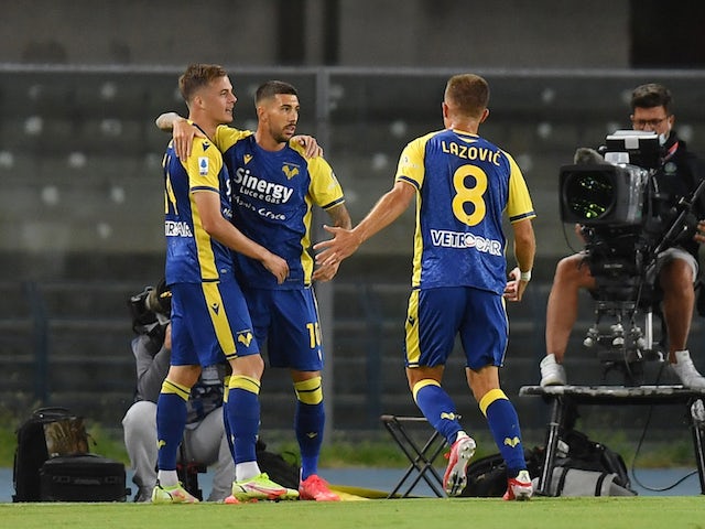 Hellas Verona's Ivan Ilic celebrates scoring their first goal with teammates on August 27, 2021