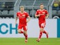 Union Berlin's Andreas Voglsammer celebrates scoring their second goal on September 19, 2021