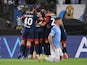 Cagliari's Keita Balde celebrates scoring their second goal with teammates on September 19, 2021