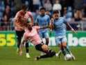 Coventry City's Callum O'Hare in action with Cardiff City's Marlon Pack on September 15, 2021