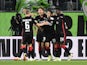 Eintracht Frankfurt's Sam Lammers celebrates scoring their first goal with teammates on September 19, 2021