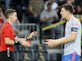 Harry Maguire reacts to Aaron Wan-Bissaka red card