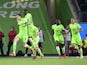 Wolfsburg's Wout Weghorst celebrates scoring their first goal with teammates on September 19, 2021