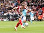 Sheffield United's Billy Sharp shoots at goal against Derby County in the Championship on September 25, 2021