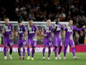 Tottenham Hotspur players celebrate their penalty-shootout win over Wolverhampton Wanderers in the EFL Cup on September 22, 2021