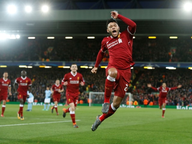 Liverpool's Alex Oxlade-Chamberlain celebrates scoring against Manchester City on April 4, 2018