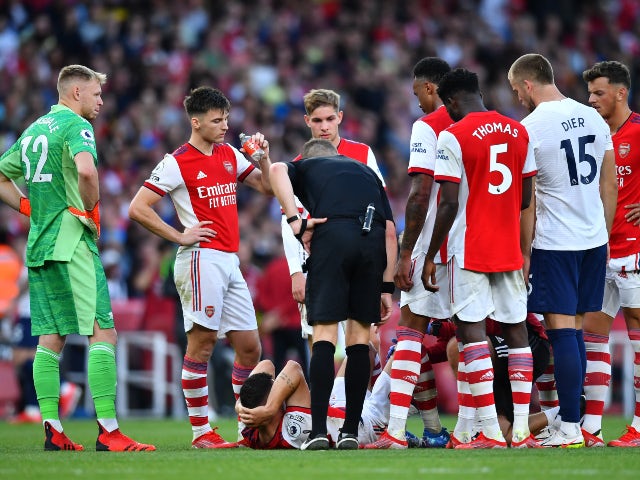 Arsenal's Granit Xhaka goes down injured against Tottenham Hotspur on September 26, 2021