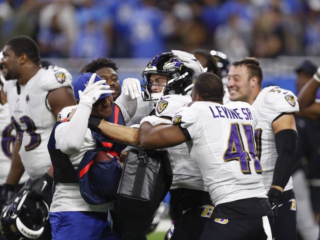 Baltimore Ravens kicker Justin Tucker (9) gets mobbed after the game against the Detroit Lions at Ford Field on September 26, 2021