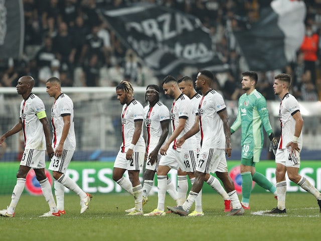 Besiktas players look dejected as they walk off at half time on September 15, 2021