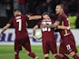 Cluj's Claudiu Petrila celebrates scoring their first goal with Constantin Paun-Alexandru and Denis Alibec Inquam on September 30, 2021