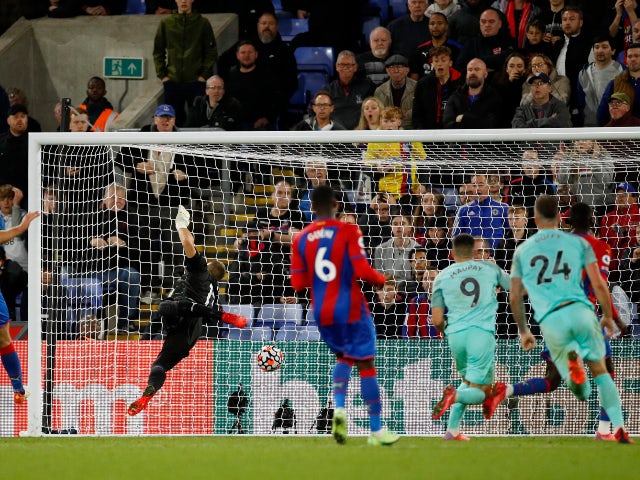 Brighton & Hove Albion's Neal Maupay scores their first goal against Crystal Palace in the Premier League on September 27, 2021