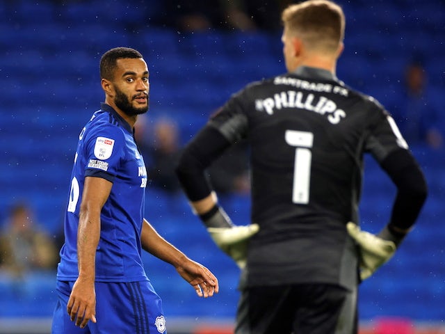 Cardiff City's Curtis Nelson reacts after scoring an own goal on September 28, 2021