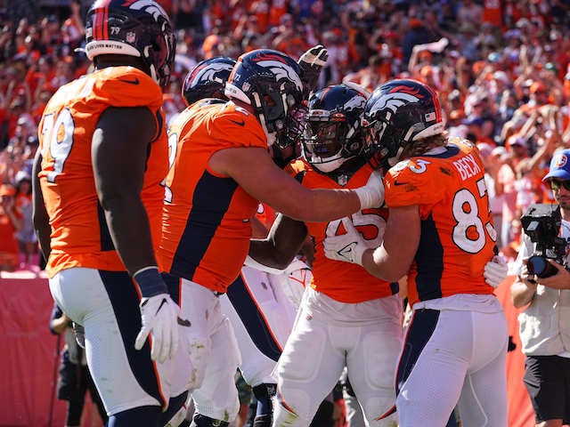 Denver Broncos running back Melvin Gordon (25) celebrates his rushing touchdown with tight end Andrew Beck (83) and offensive tackle Garett Bolles (72) in the second quarter against the New York Jets at Empower Field at Mile High on  September 26, 2021