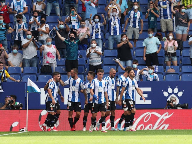 Espanyol's Raul de Tomas celebrates scoring their first goal with teammates on September 12, 2021