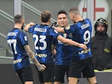 Inter Milan's Lautaro Martinez celebrates scoring their first goal with teammates on September 25, 2021
