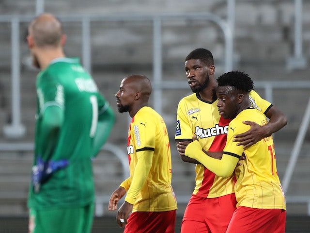 Lens' Arnaud Kalimuendo celebrates scoring their second goal on October 1, 2021