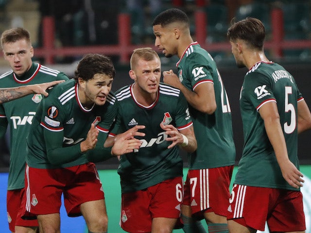 Lokomotiv Moscow players celebrate their first goal scored by Faustino Anjorin on September 16, 2021