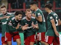 Lokomotiv Moscow players celebrate their first goal scored by Faustino Anjorin on September 16, 2021