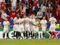 Sevilla's Ivan Rakitic celebrates scoring their first goal with teammates on September 14, 2021