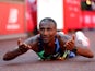 Sisay Lemma celebrates winning the men's London Marathon on October 3, 2021