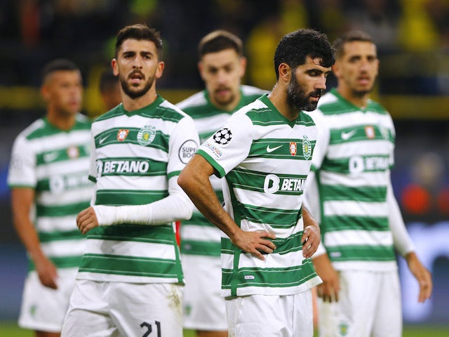 Sporting Lisbon's Luis Neto and Paulinho look disappointed on 28 September 2021