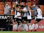 Valencia's Hugo Duro celebrates scoring their first goal with teammates on September 19, 2021