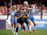 Tottenham Hotspur's Kit Graham in action with Brighton and Hove Albion's Megan Connolly in the Women's Super League on October 10, 2021