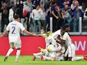 France's Theo Hernandez celebrates scoring their third goal against Belgium in the UEFA Nations League on October 7, 2021