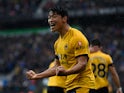 Hwang Hee-Chan celebrates scoring for Wolverhampton Wanderers against Newcastle United in the Premier League on October 2, 2021