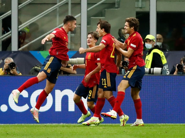 Spain's Ferran Torres celebrates scoring their first goal against Italy in the UEFA Nations League on October 6, 2021