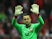 Lukasz Fabianski waves to fans after he is substituted off in his final match for Poland on October 9, 2021 