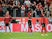 Bayer Leverkusen's Panagiotis Retsos, Odilon Kossounou and Amine Adli look dejected during the match on October 17, 2021