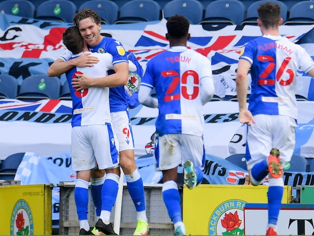 Blackburn Rovers' Sam Gallagher celebrates scoring their second goal with teammates on October 16, 2021
