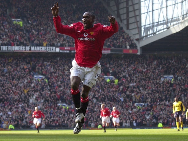 Dwight Yorke celebrates scoring for Manchester United in 2001