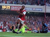 Ian Wright celebrates scoring for Arsenal in 1997