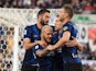Inter Milan's Ivan Perisic celebrates scoring their first goal with teammates on October 16, 2021