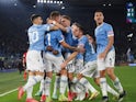 Lazio's Sergej Milinkovic-Savic celebrates scoring their third goal with teammates on October 16, 2021